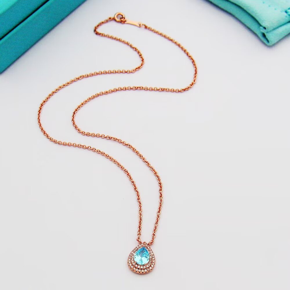 Tiffany & Co. Aquamarine and Diamond Pendant - 