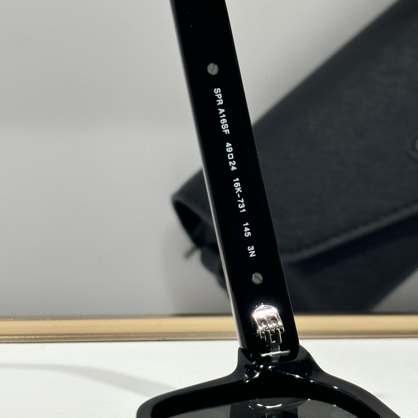 Prada Sunglasses With Iconic Metal Plaque   SPR A16SF - DesignerGu