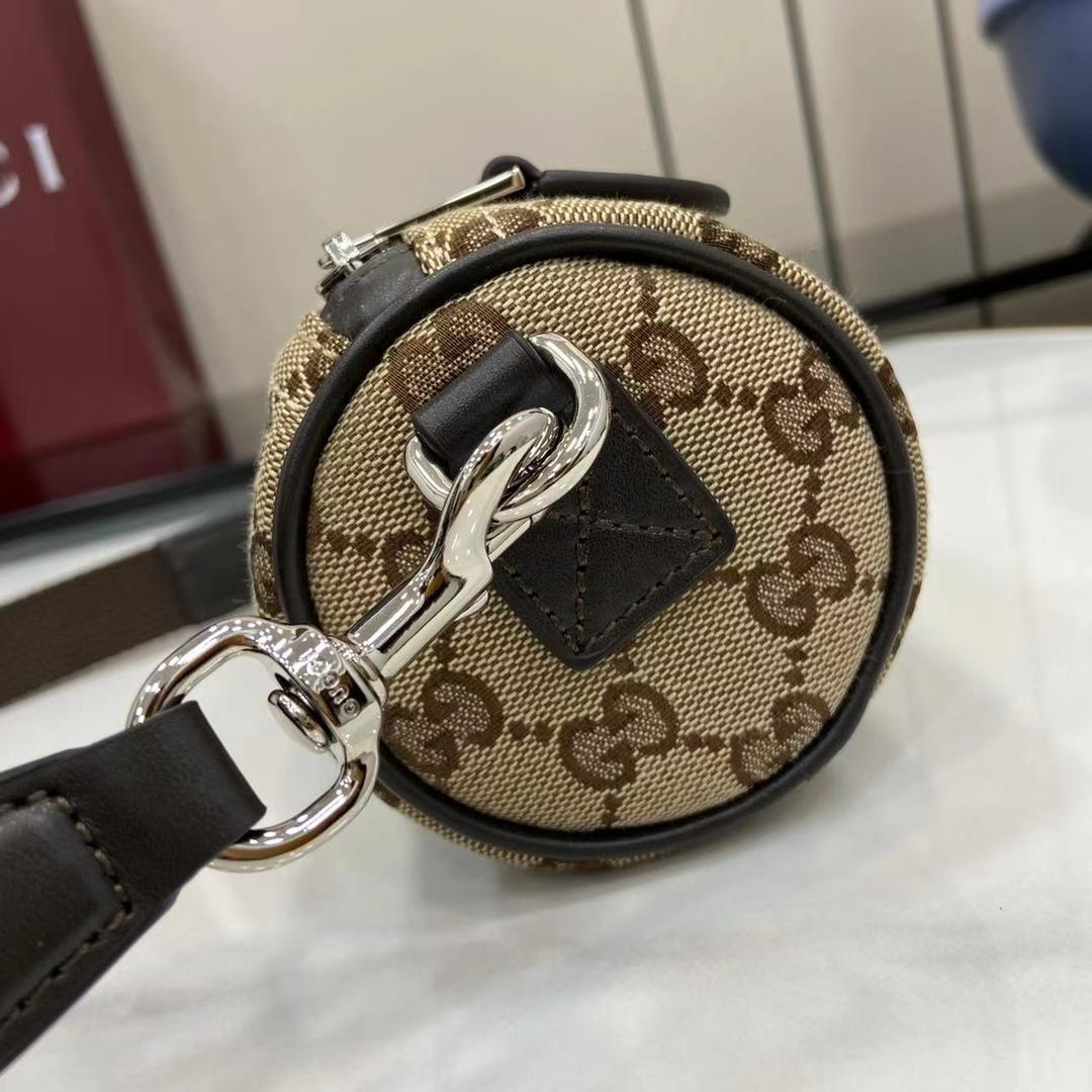 Gucci GG Canvas Mini Cylinder Bag - DesignerGu