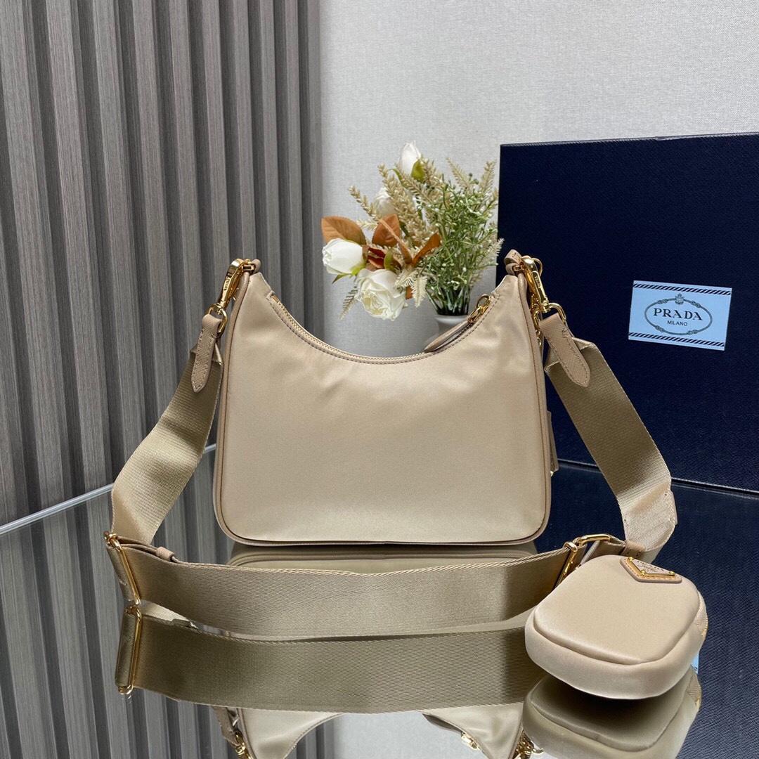 Prada Re-Edition 2005 Re-Nylon And Saffiano Leather Bag With Charm - DesignerGu