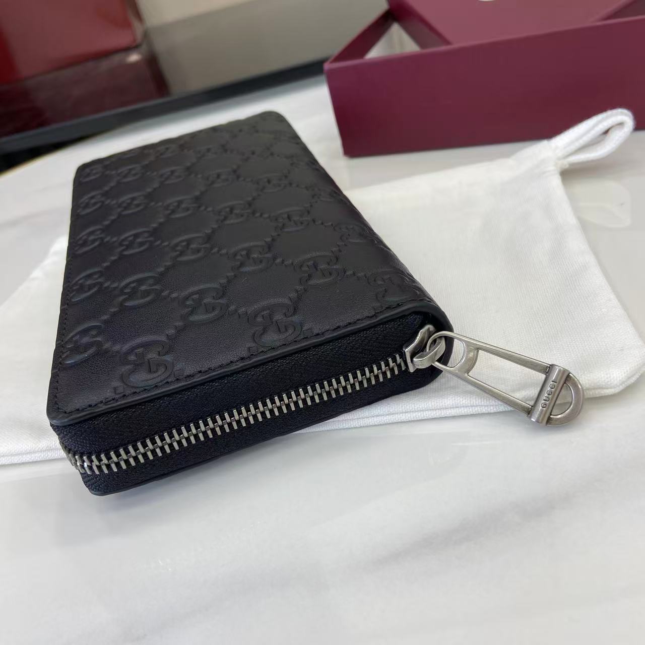 Gucci GG Emblem Zip Around Wallet - DesignerGu