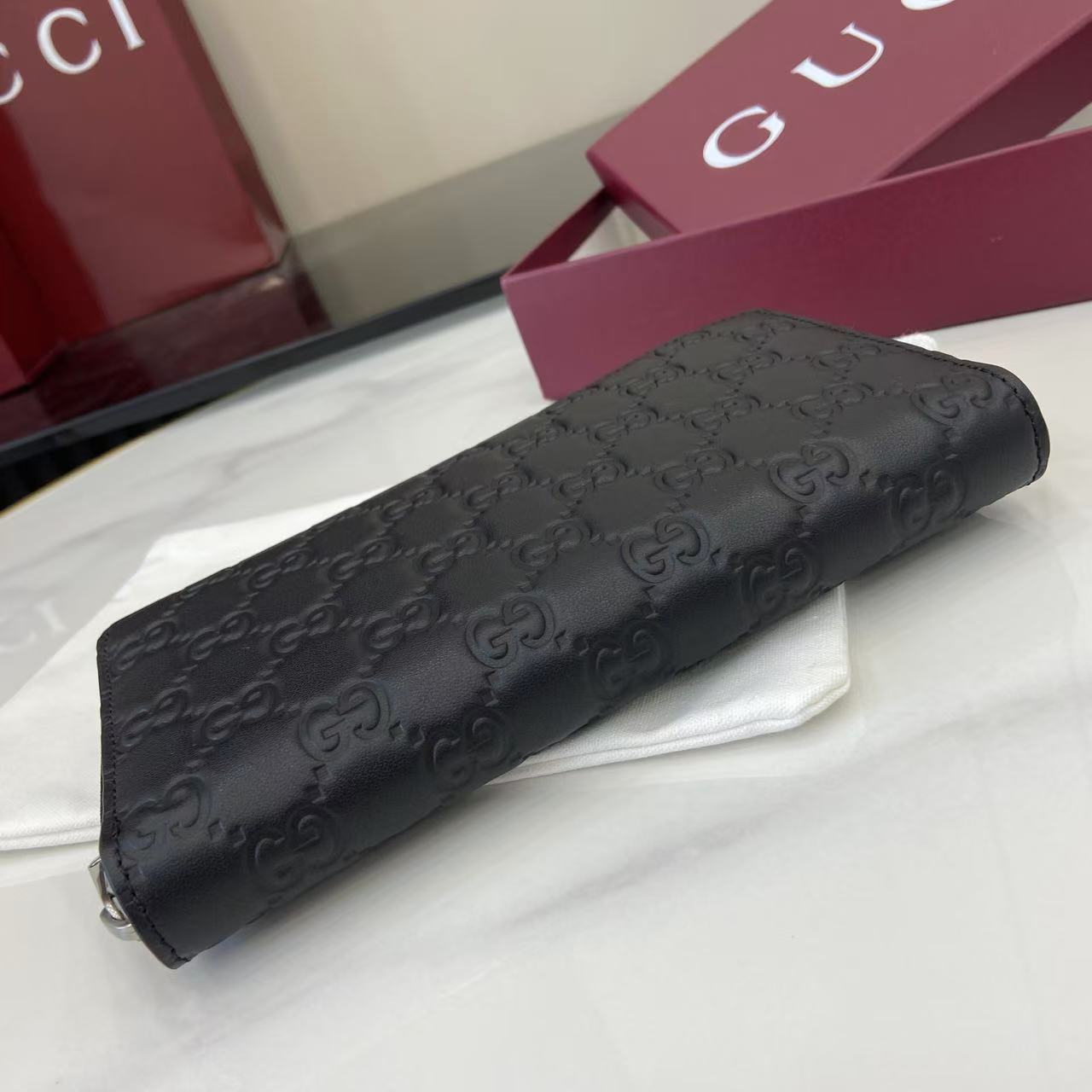 Gucci GG Emblem Zip Around Wallet - DesignerGu