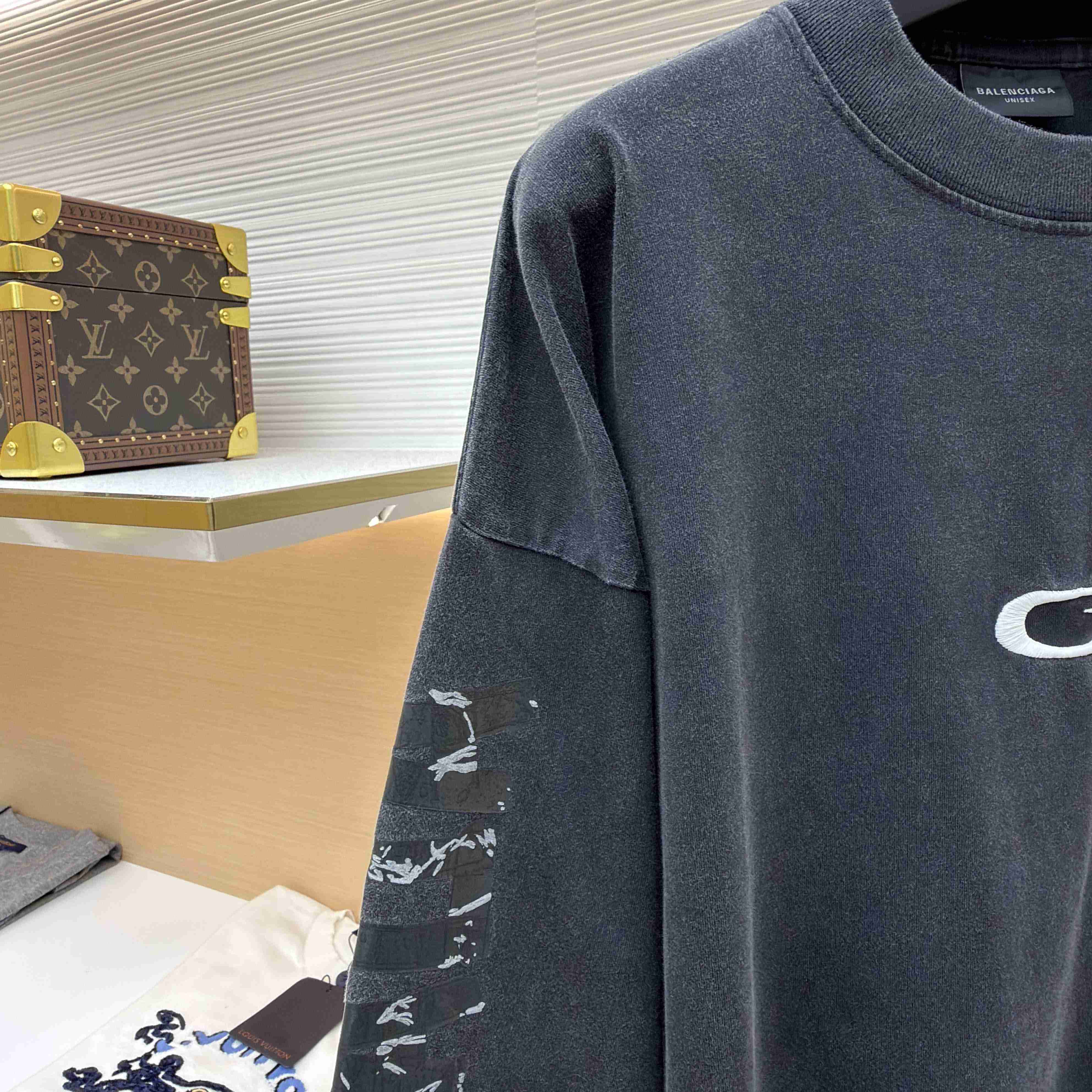 Balenciaga Men's Transparent Tape Shifted Oversized Long Sleeve T-shirt - DesignerGu