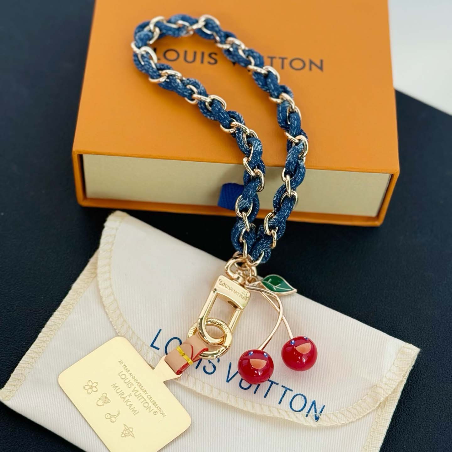 Louis Vuitton LV x TM Denim Cerise Phone Holder S00   M02623 - DesignerGu