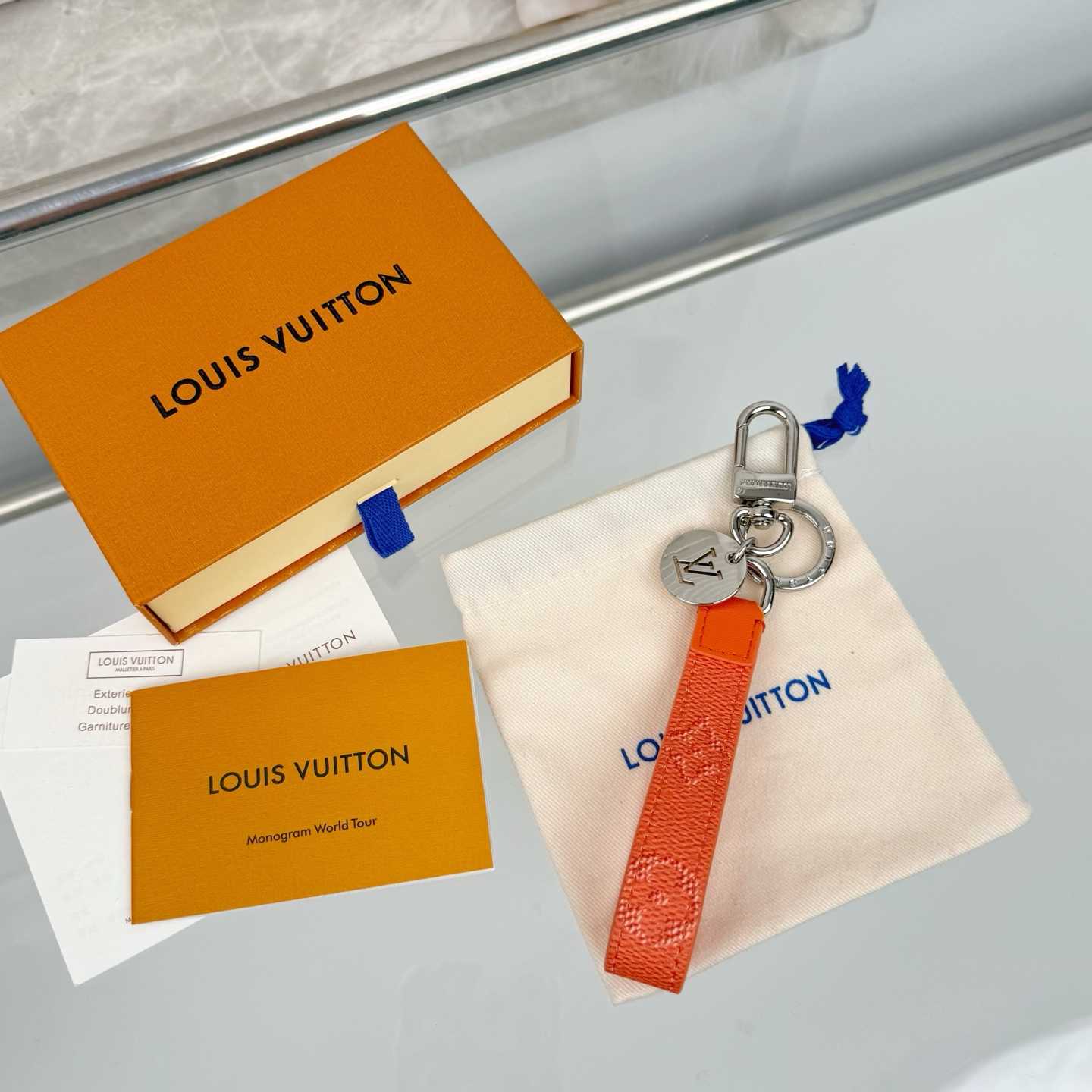 Louis Vuitton LV Slim Dragonne Key Holder and Bag Charm S00  - DesignerGu