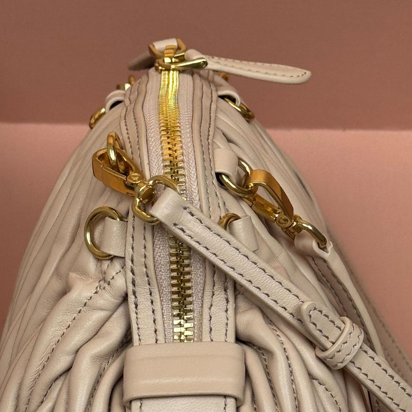 Miu Miu Caprice Matelassé Nappa Leather Clutch - DesignerGu