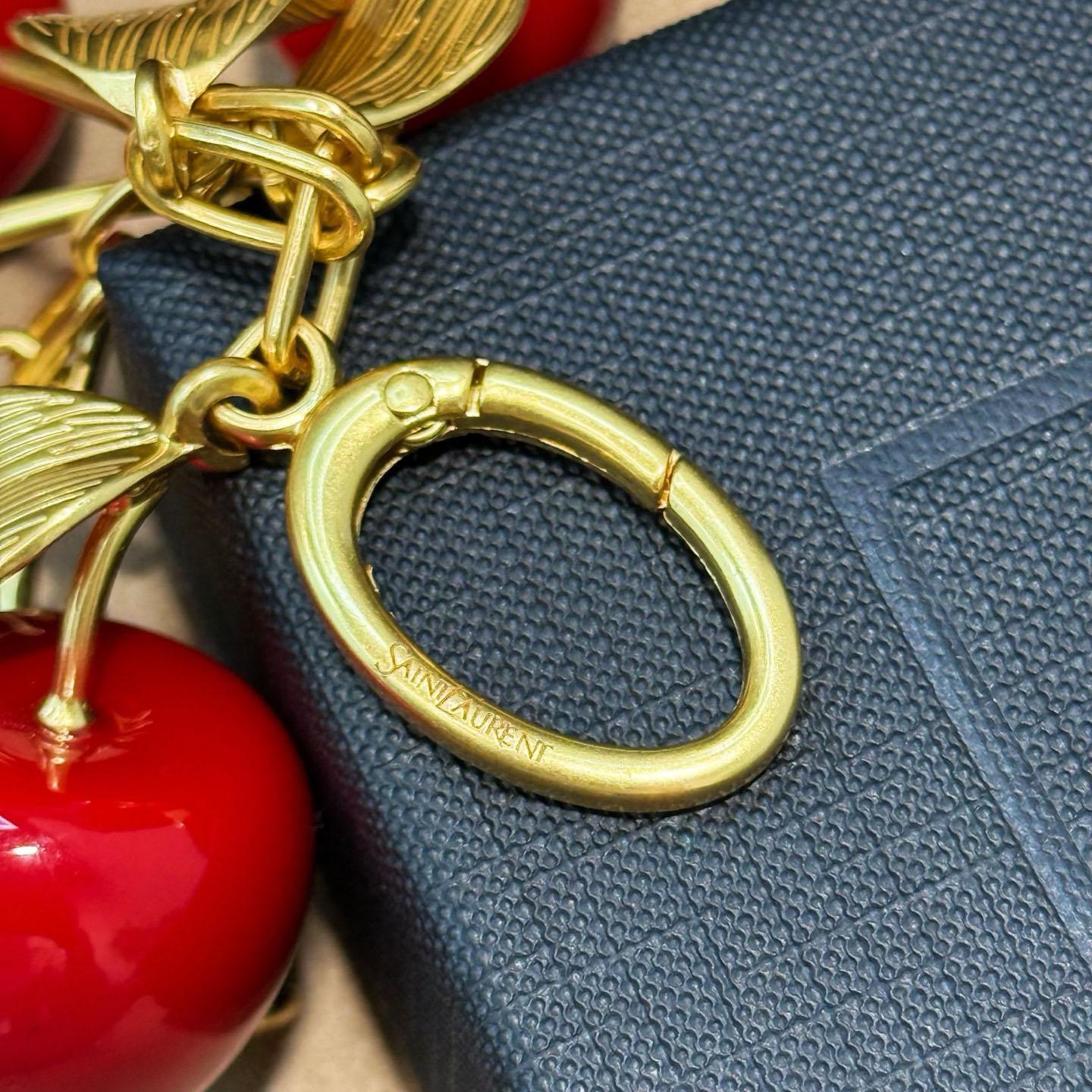 Saint Laurent CASSANDRE Cherry Bag Charm In Resin And Metal - DesignerGu