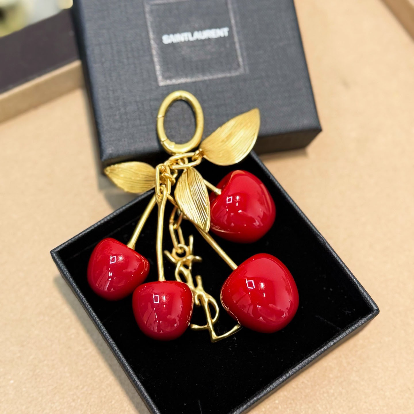 Saint Laurent CASSANDRE Cherry Bag Charm In Resin And Metal - DesignerGu