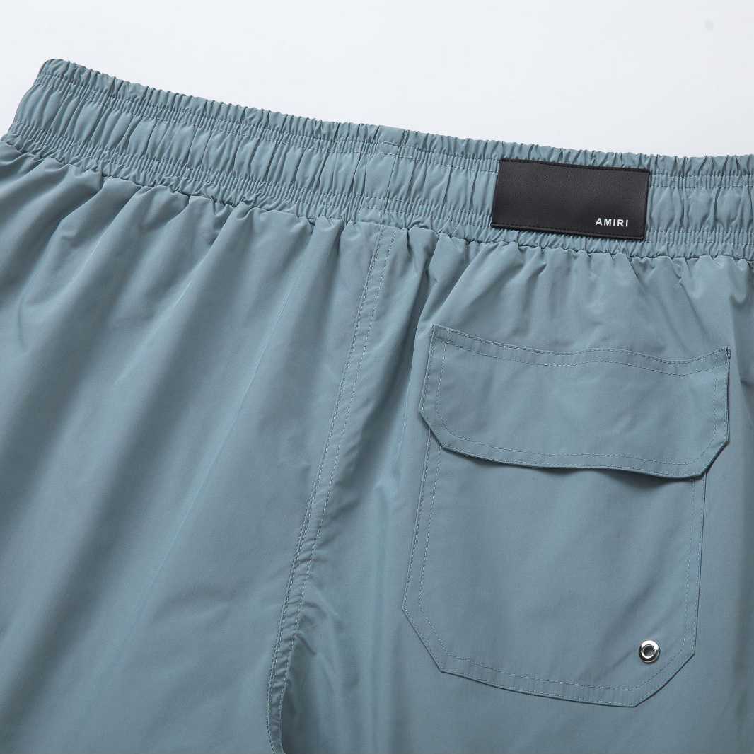 Amiri Core Logo Swim Shorts Dusty Blue - DesignerGu