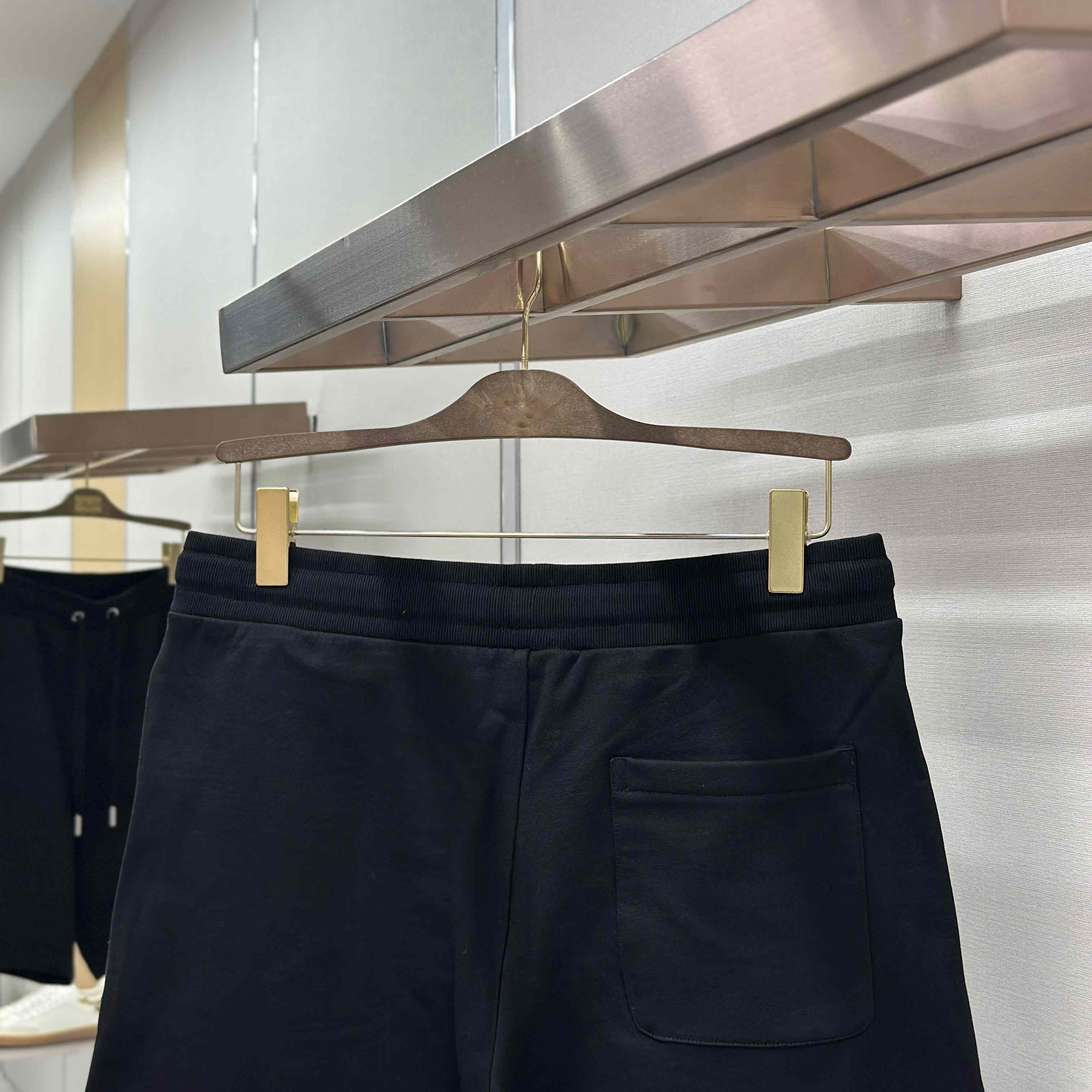 AMI Paris  Ami de Coeur Embroidered Shorts - DesignerGu