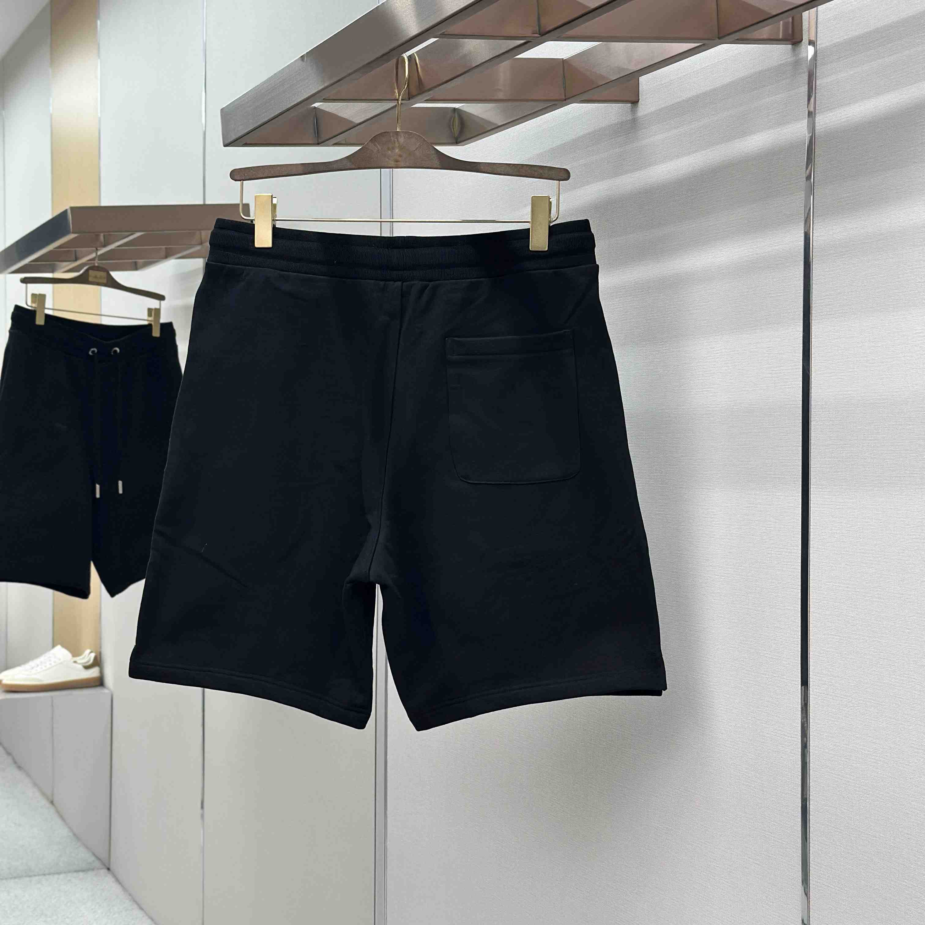 AMI Paris  Ami de Coeur Embroidered Shorts - DesignerGu