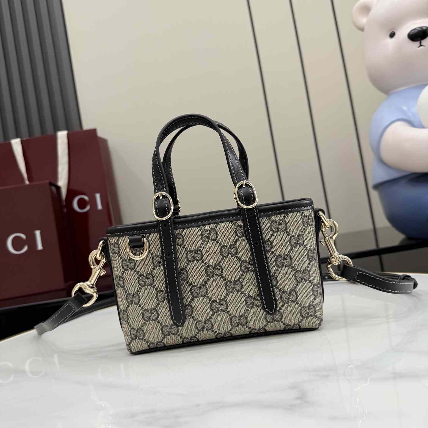 Gucci GG Emblem Mini Bag 855491 - DesignerGu