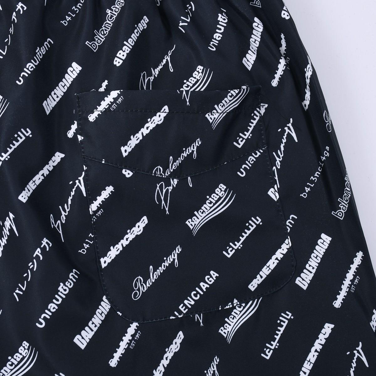 Balenciaga All-Over Logo Trousers - 