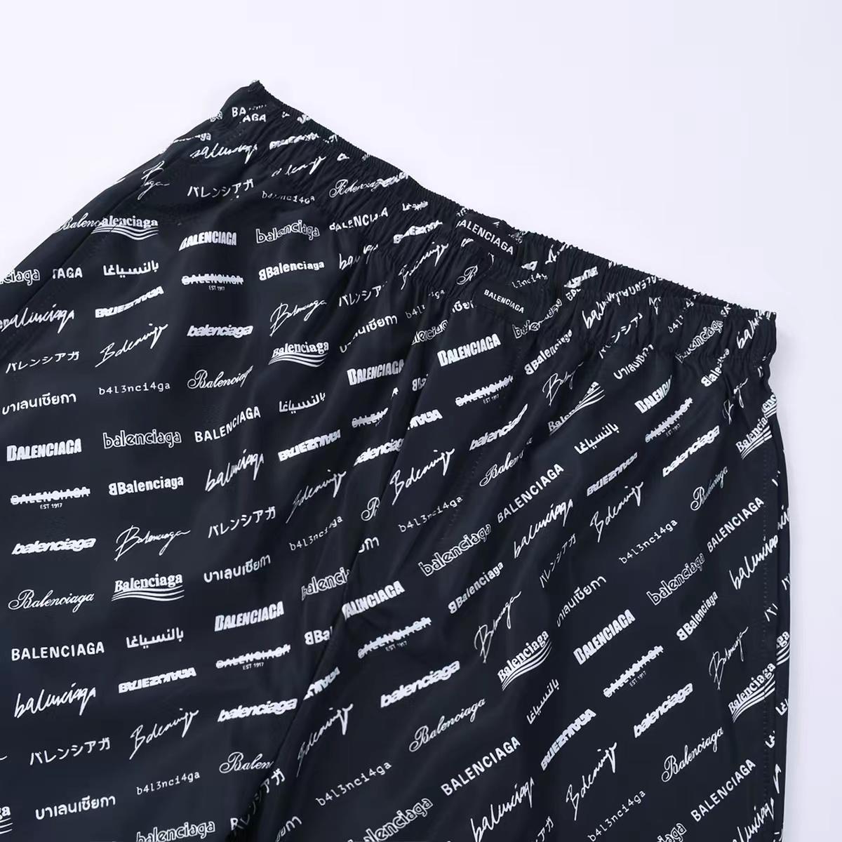 Balenciaga All-Over Logo Trousers - 
