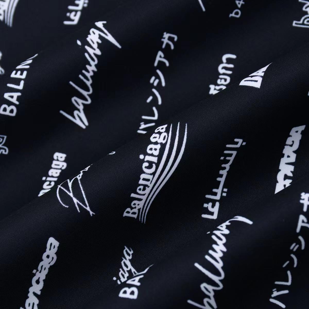Balenciaga All-Over Logo Trousers - 