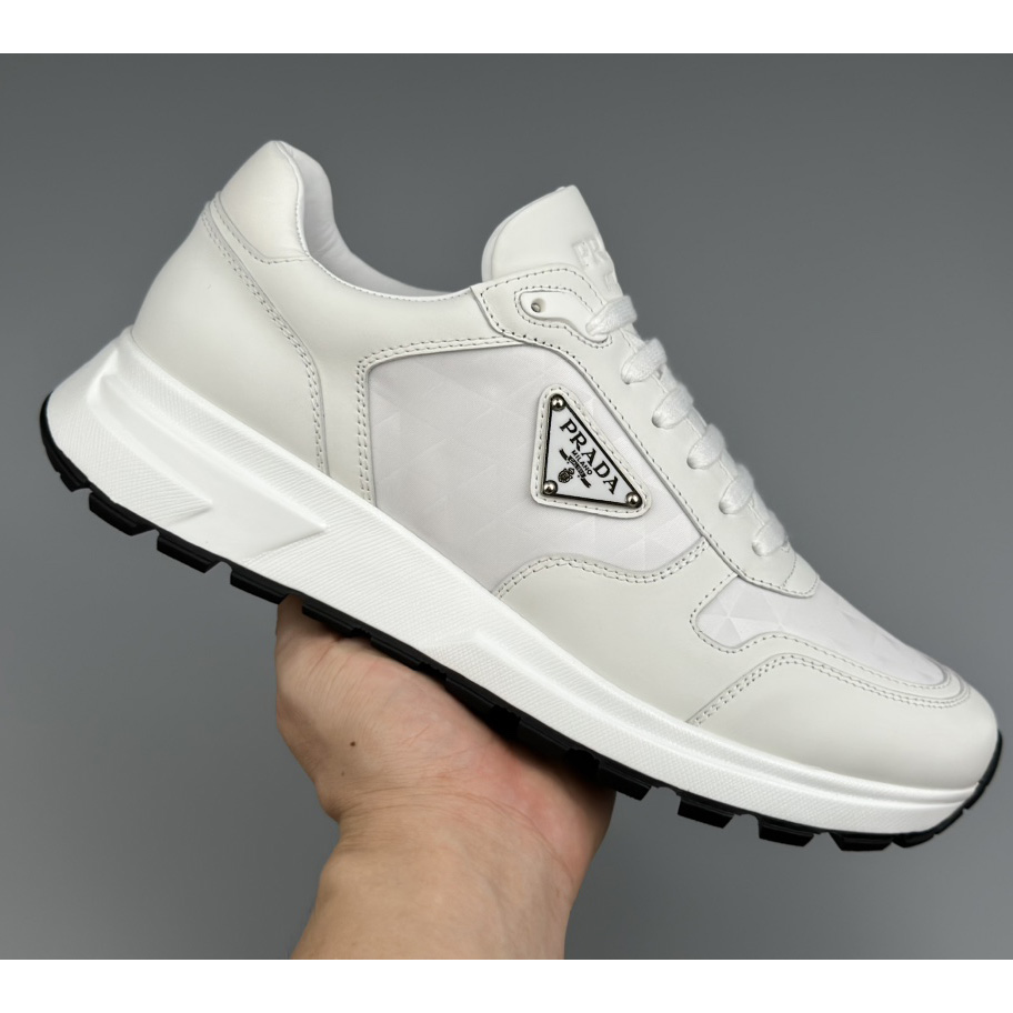 Prada Leather And Re-Nylon High-top Sneakers - 