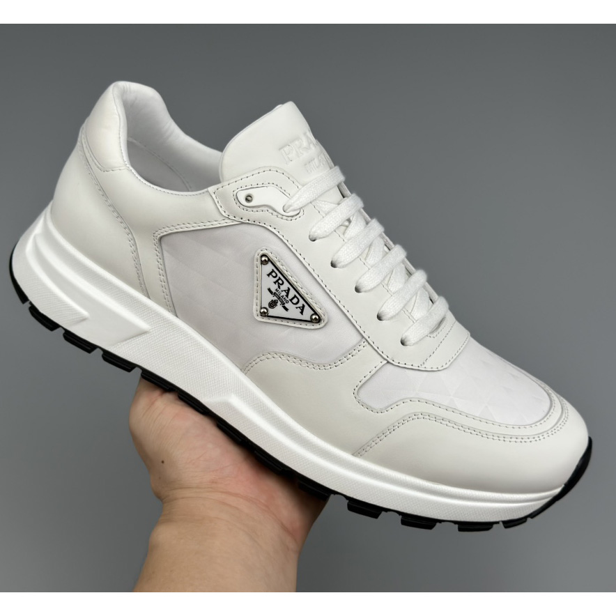 Prada Leather And Re-Nylon High-top Sneakers - 