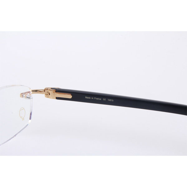 Cartier CT 5952143 Eyeglasses In Gold With Black Arms - DesignerGu