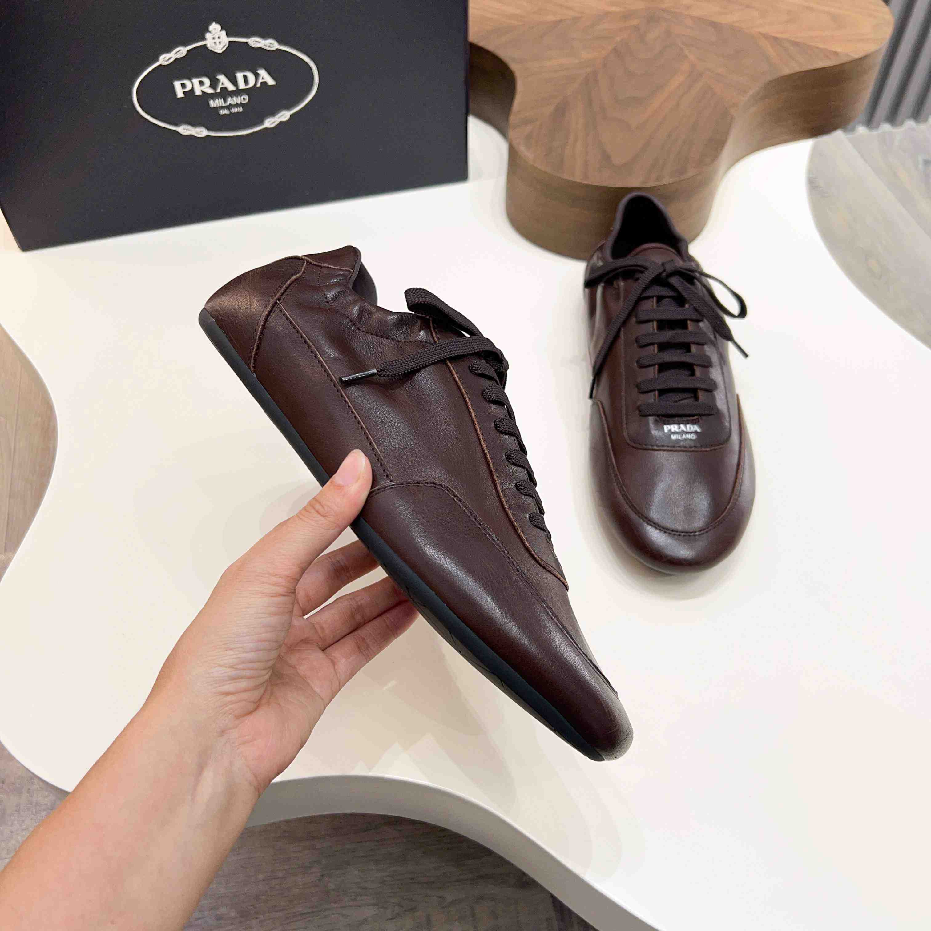 Prada Collapse Leather Sneakers - DesignerGu