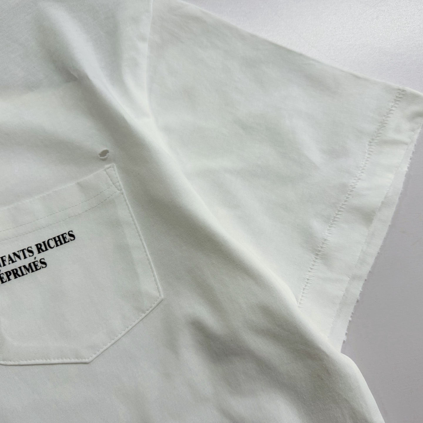 Enfants Riches Déprimés  Distressed Logo-Print Cotton-Jersey T-Shirt - White - DesignerGu