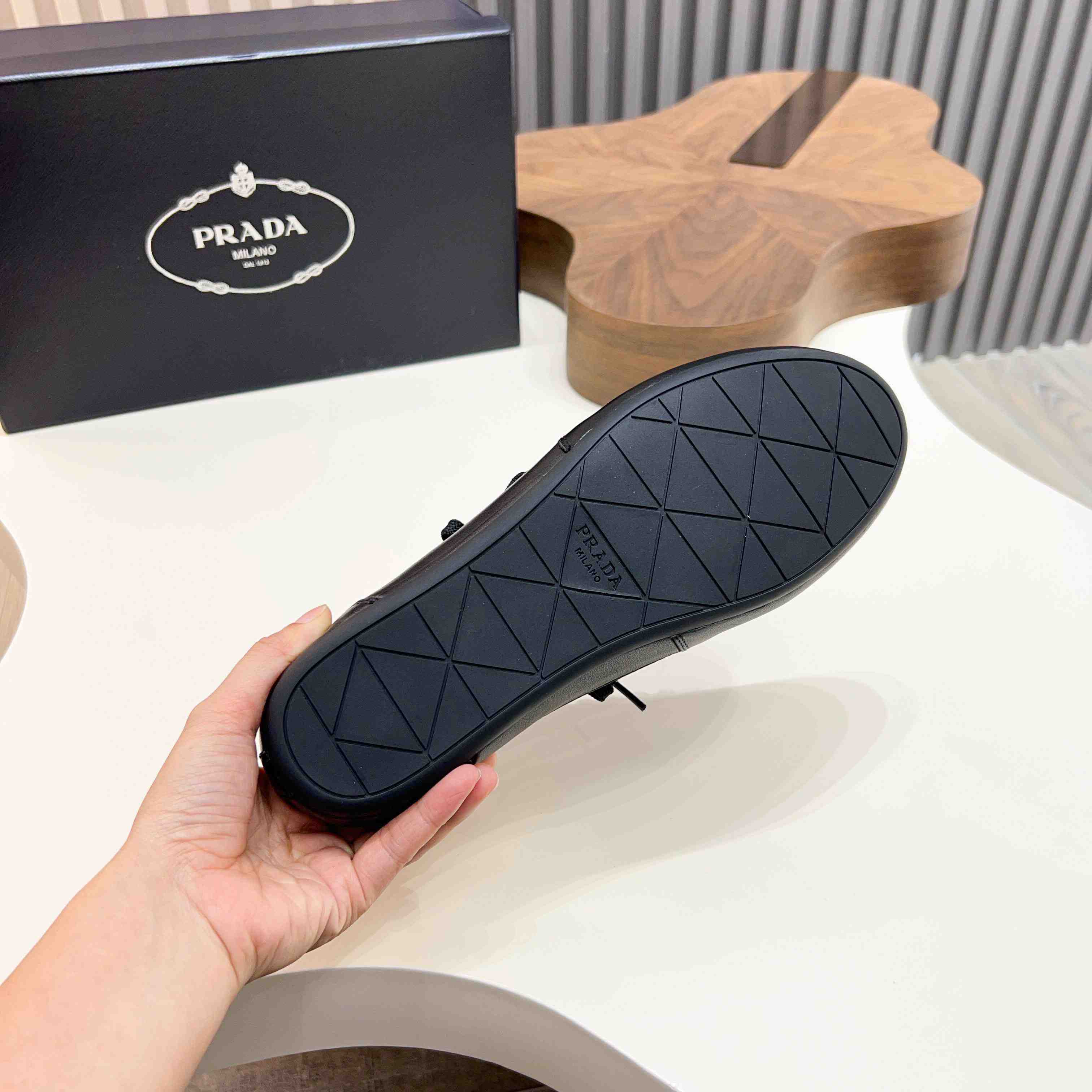 Prada Collapse Leather Sneakers - DesignerGu