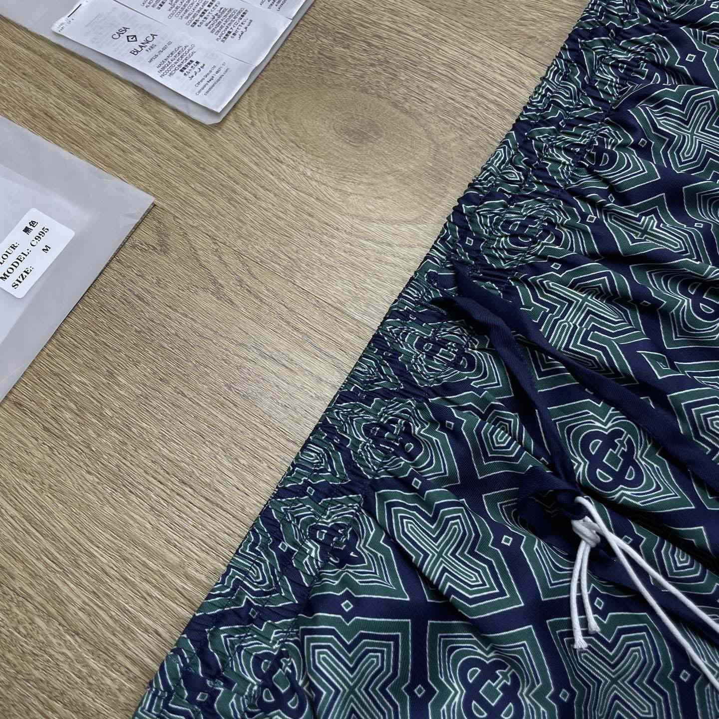 Casablanca Dark Green Radiating Monogram Silk Shorts CA3606 - DesignerGu