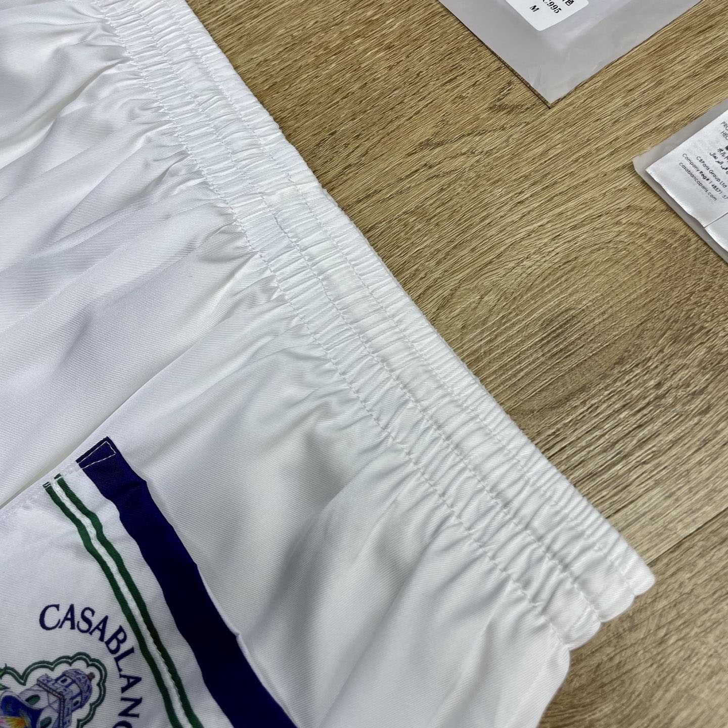 Casablanca White Hotel Emblem Silk Shorts CA3601 - DesignerGu